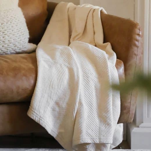 Organic Cotton Blanket on chair in living room