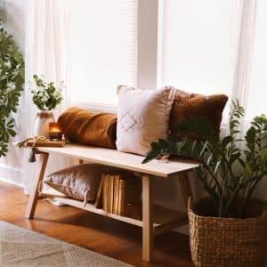 Decorative Hardwood Bench - in living room with items on shelf