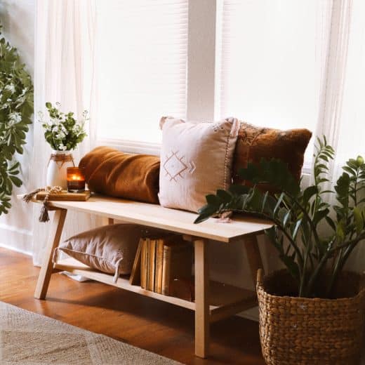 Decorative Hardwood Bench - in living room with items on shelf