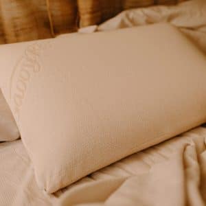 Natural Talalay latex pillow for side sleepers - plush pillow on Savvy Rest bed